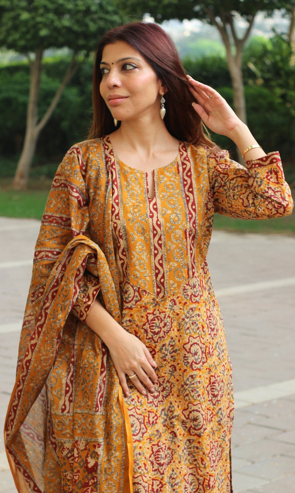 Cotton Mustard & Red Printed Suit with Mul Printed Dupatta - Baareeki